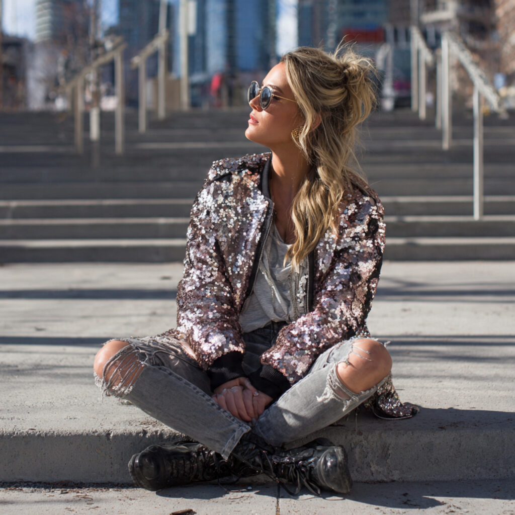 20 Best Rock Concert Outfit Looks Ideas: 20+ Edgy Styles to Stand Out at Any Show 16 Sequined Statement Jacket and Distressed Grey Jeans